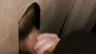 Hot sucking action at the homemade glory hole 6